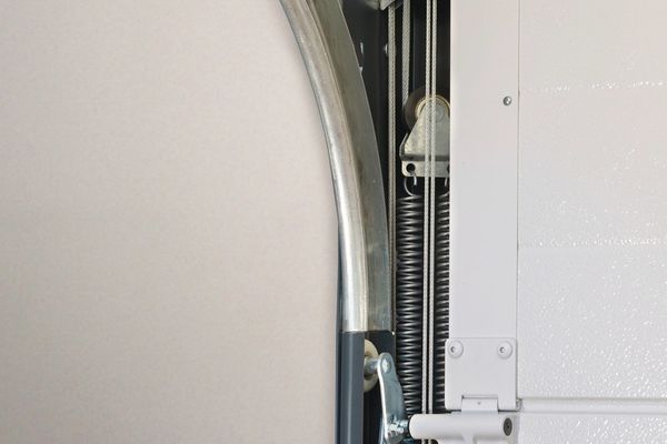 Montage porte de garage sectionnelle isea