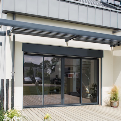 Porte de garage coulissante pvc bouvet
