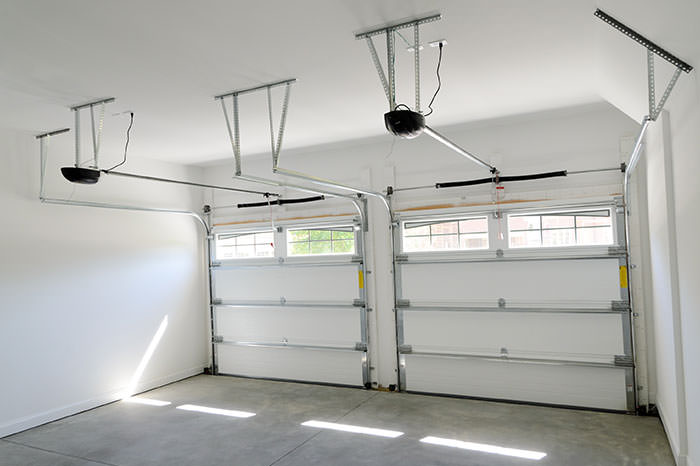 Porte de garage sectionnelle sans plafond