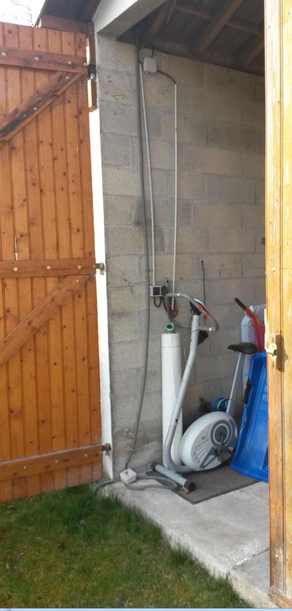 Boucher une porte de garage en parpaing