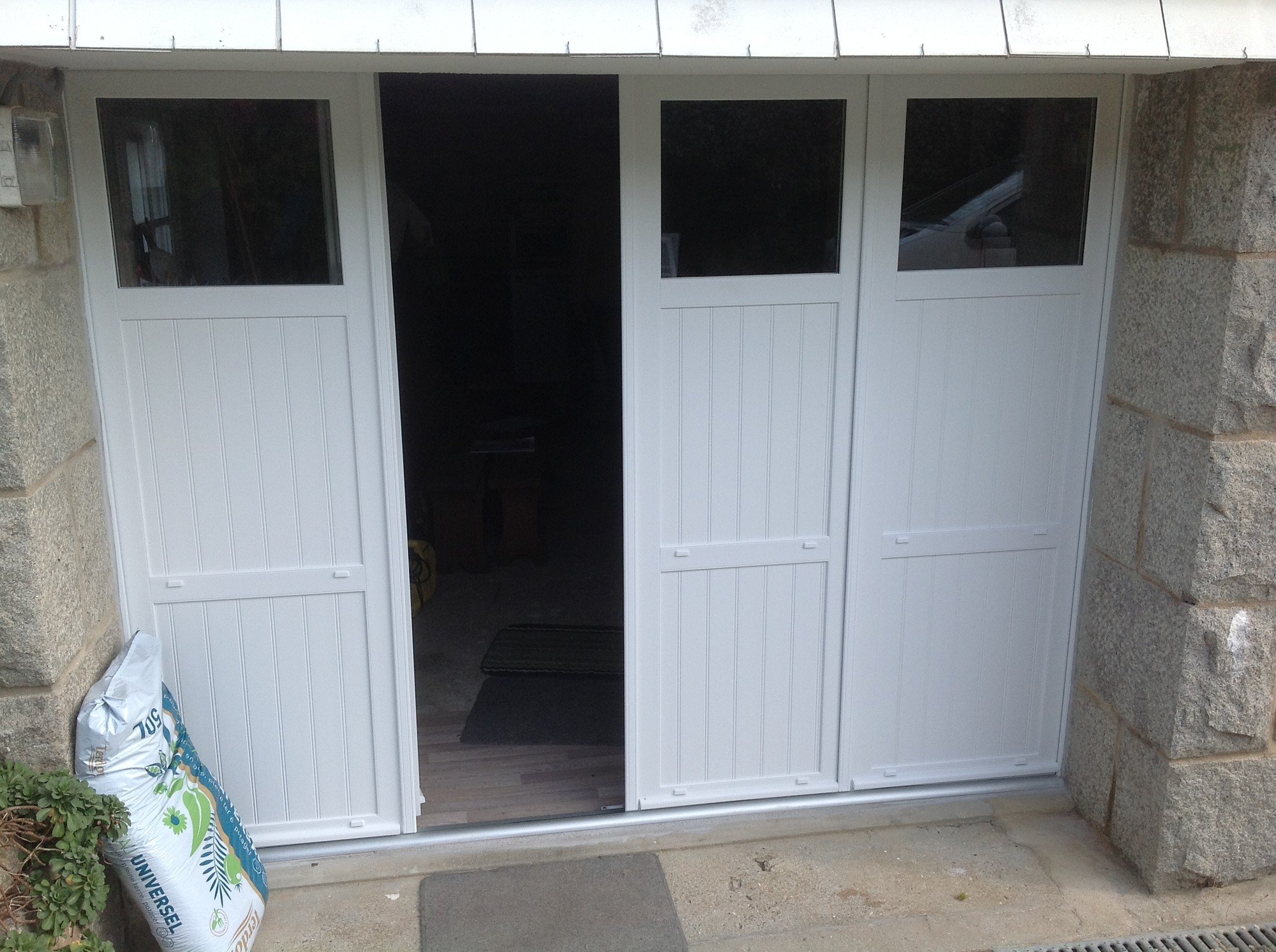 Porte de garage à la française pvc