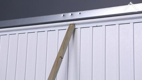 Placer une porte de garage basculante