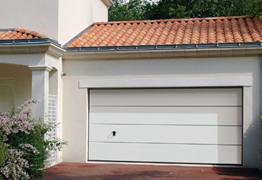 Porte de garage sectionnelle avec portillon gedimat