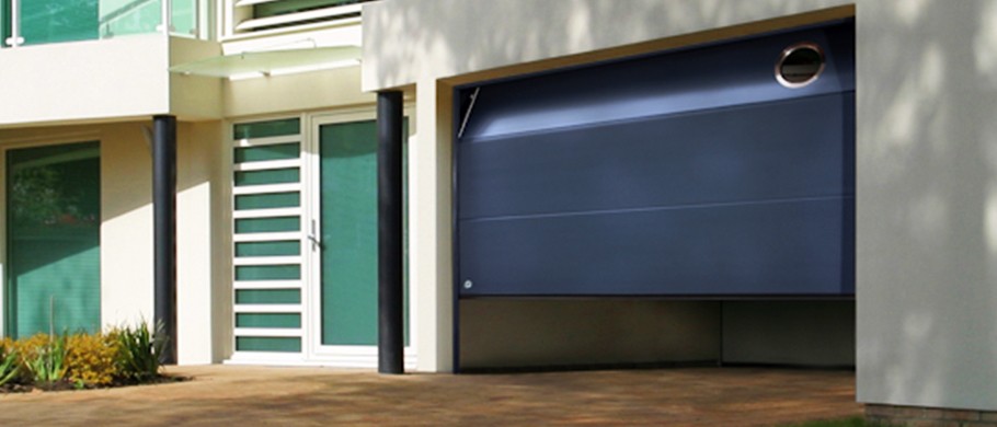 Composant porte de garage sectionnelle
