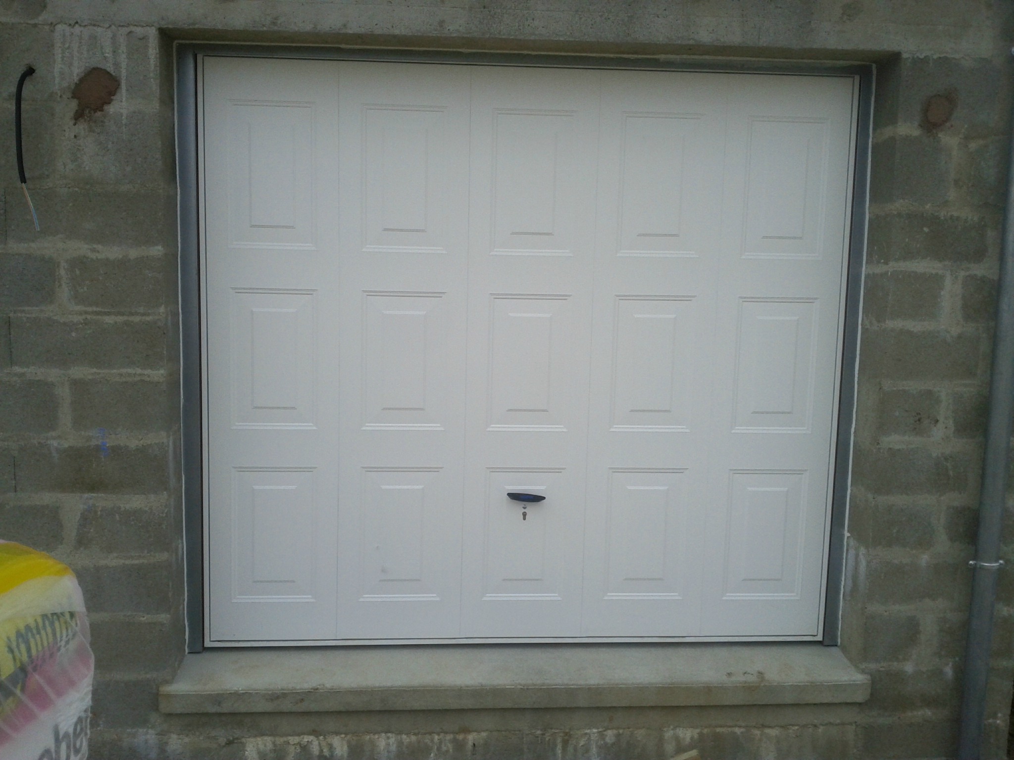 Porte de garage a cassette basculante
