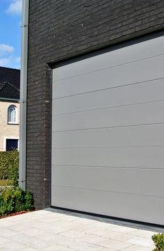 Porte de garage sectionnelle doras