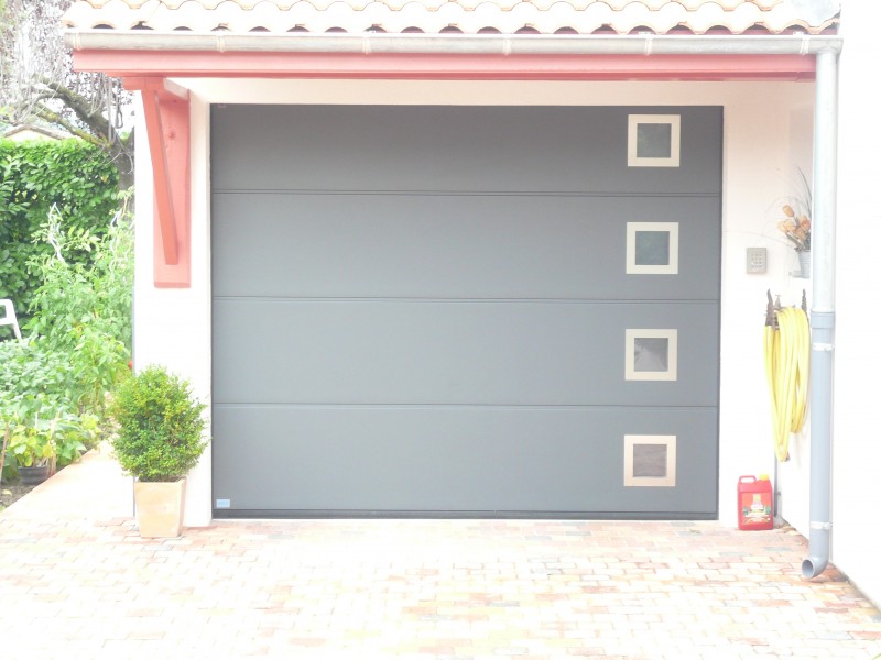 Reparateur porte de garage sectionnelle hormann