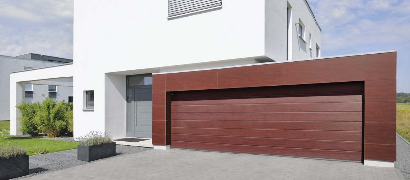 Comparateur porte de garage sectionnelle