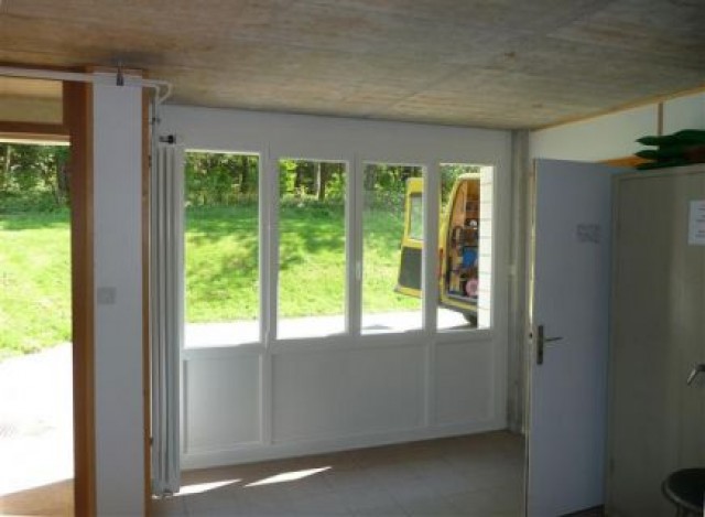 Porte de garage avec porte vitrée