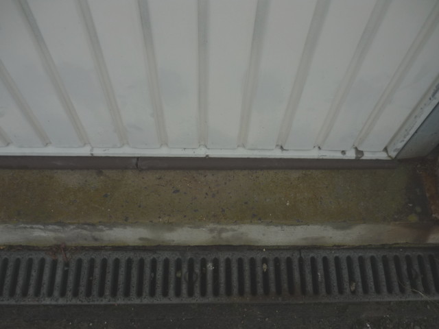 Isoler porte de garage metallique