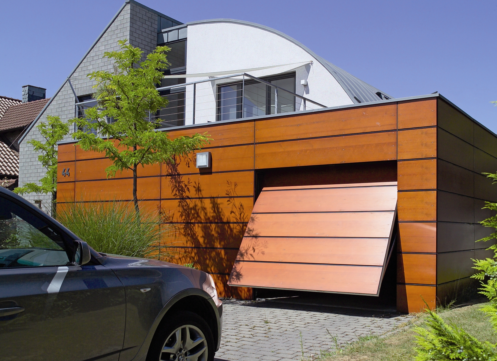 Débattement porte de garage basculante