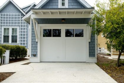 Réparateur de porte de garage sectionnelle
