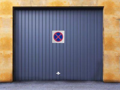 Porte de garage partie commune ou privative