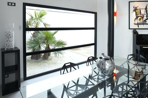 Remplacer porte de garage par baie vitree