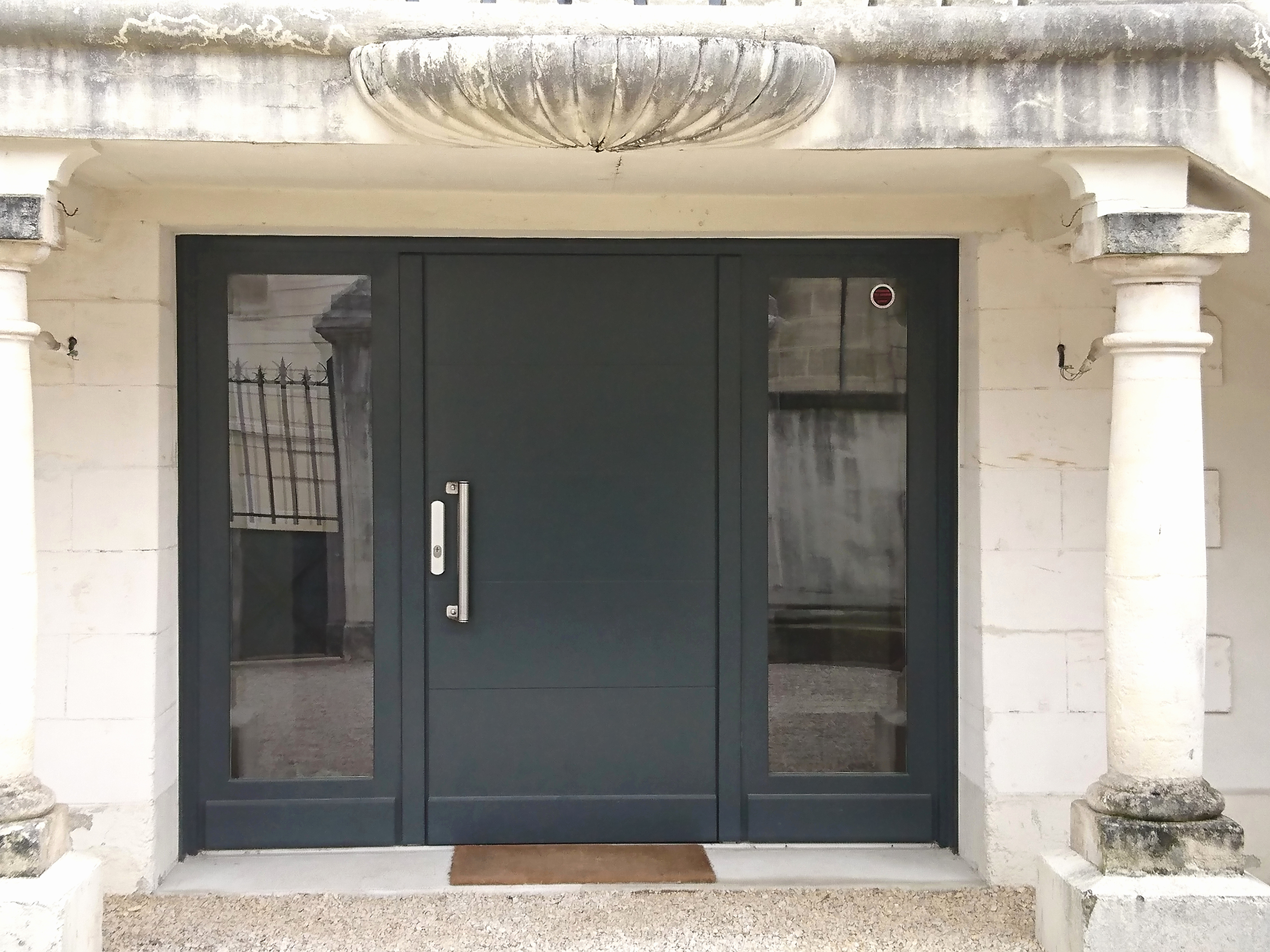 Remplacer une porte de garage par une baie vitrée
