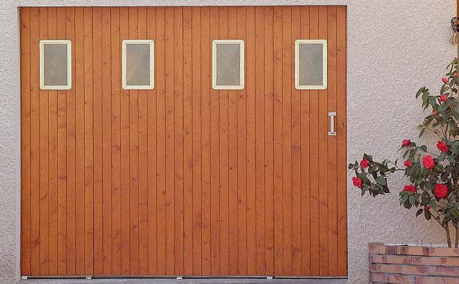 Porte de garage coulissante motorisée avec portillon tarif