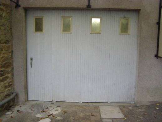 Isoler une porte coulissante de garage