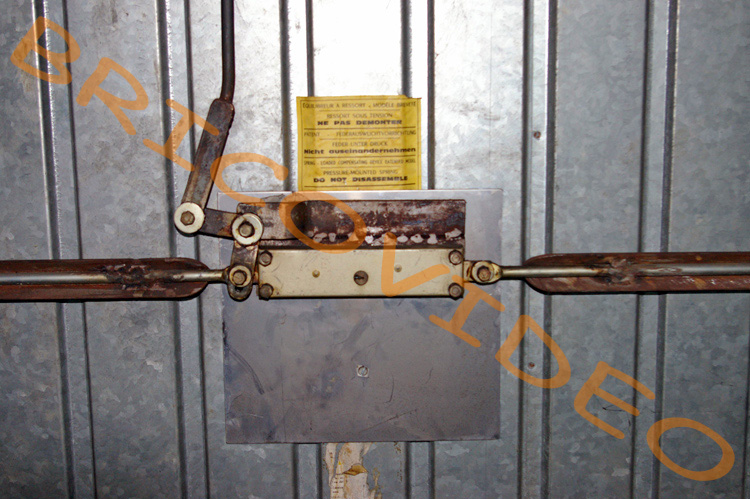 Fonctionnement serrure porte de garage basculante