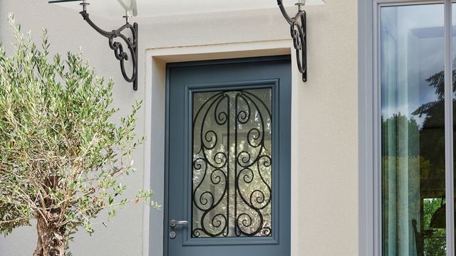 Porte de garage pour maison ancienne