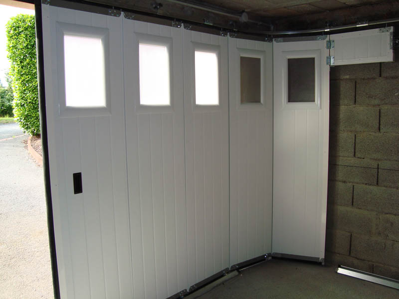 Isoler porte de garage roulante