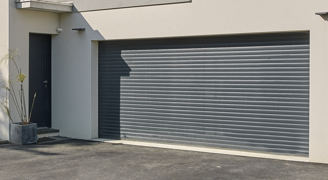 Isolation porte de garage enroulable