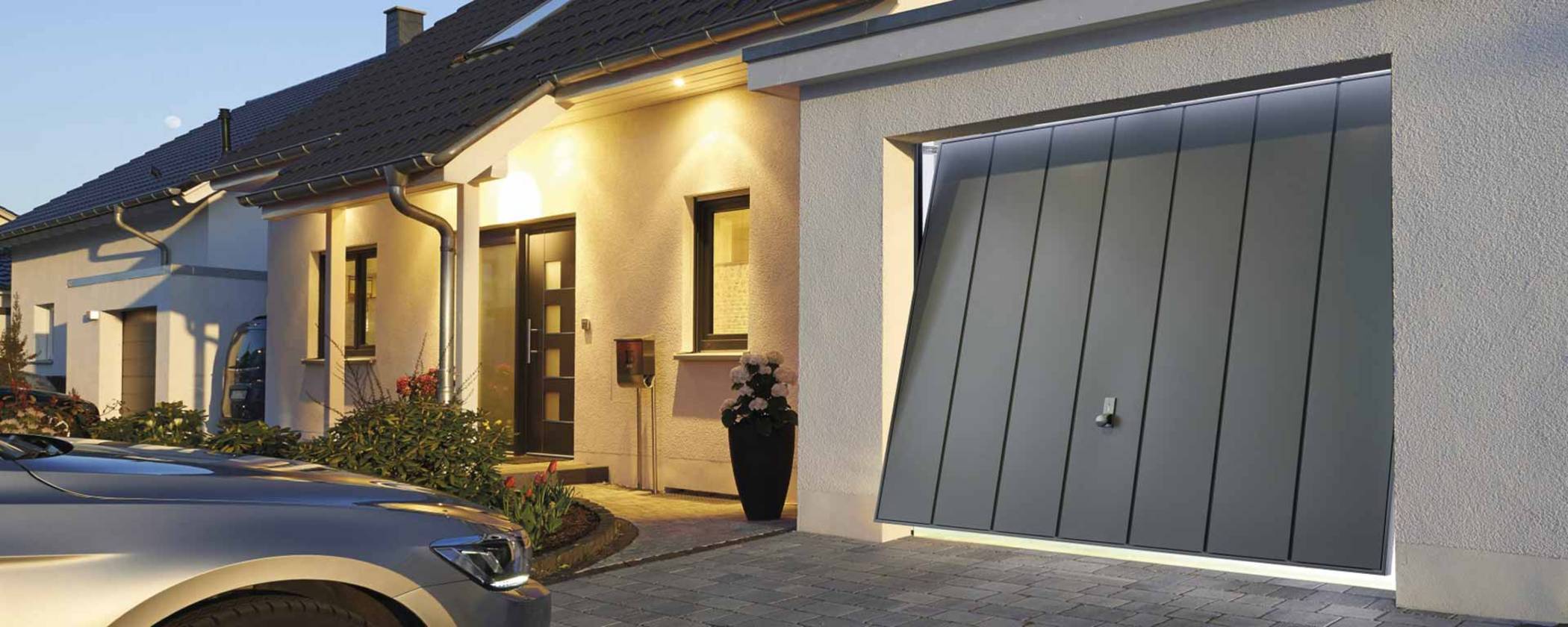 Porte de garage basculante à débordement