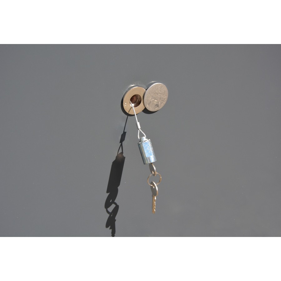 Kit de deverrouillage exterieur pour porte de garage sectionnelle