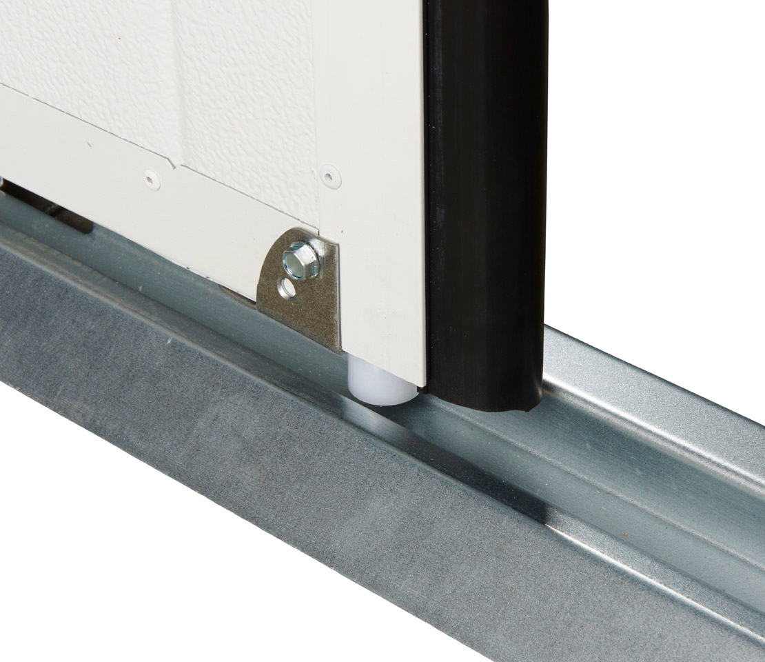 Bas de porte garage coulissante brosse