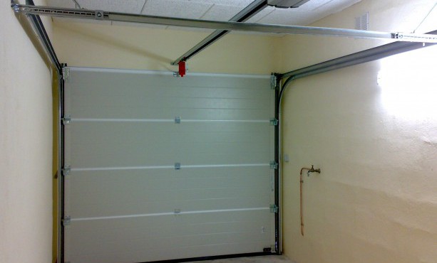 Recouper porte de garage sectionnelle