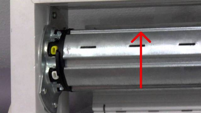 Reglage porte de garage enroulable