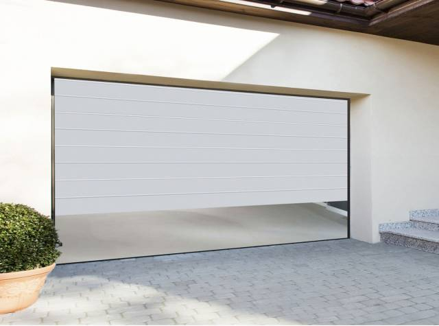 Montage porte de garage sectionnelle techpro