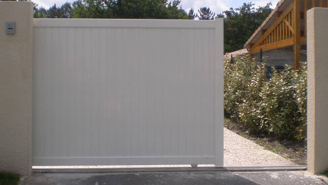 Porte de garage coulissante motorisée avis