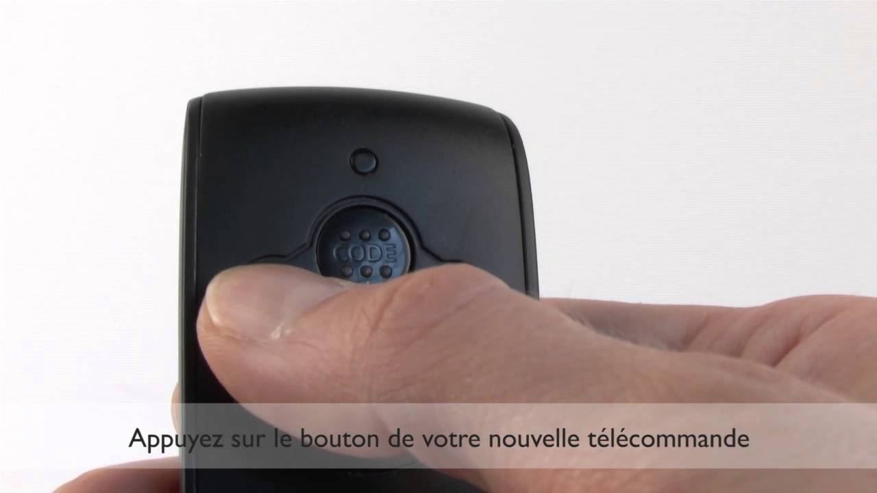 Programmer telecommande porte de garage somfy