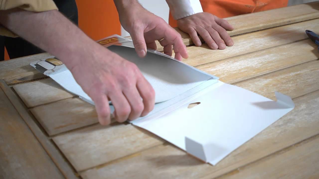 Poncer une porte de garage en bois