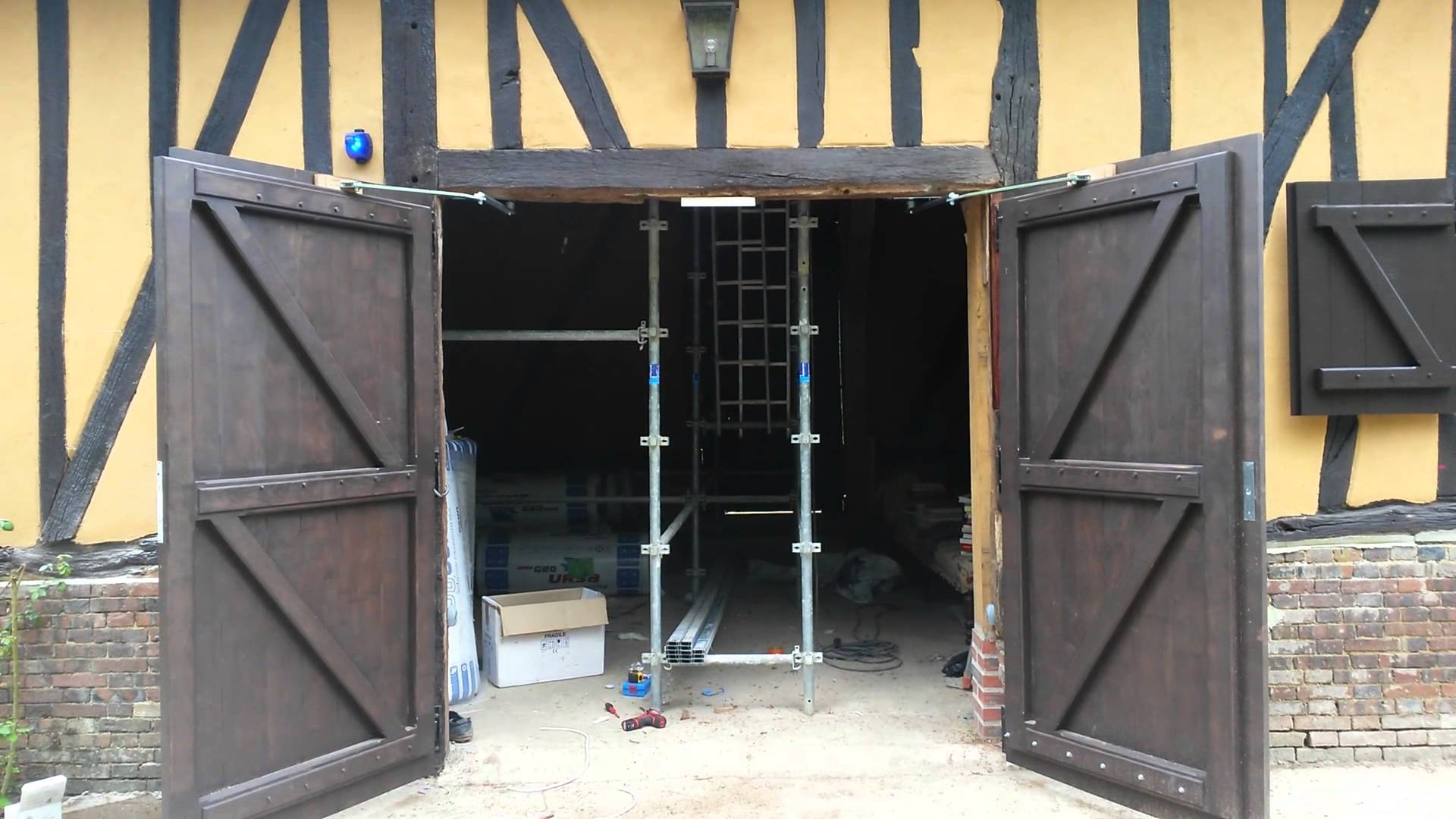 Motorisation porte de garage battante