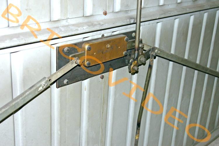 Mecanisme de porte de garage coulissante