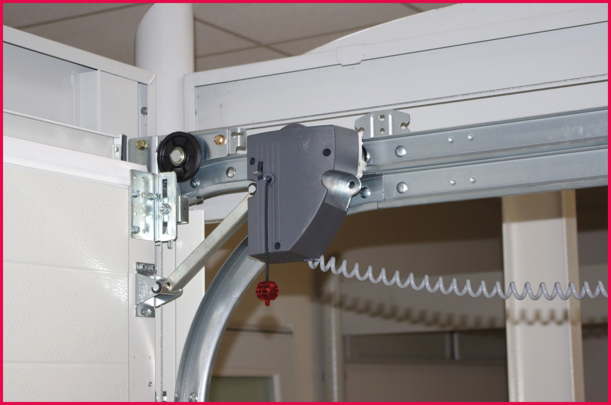 Motorisation pour porte de garage sectionnelle