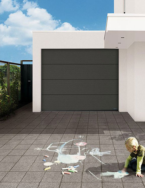 Ouverture porte de garage sectionnelle