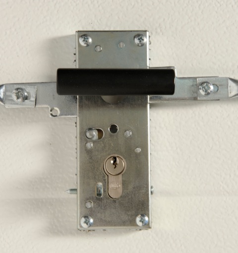 Serrure de porte de garage sectionnelle