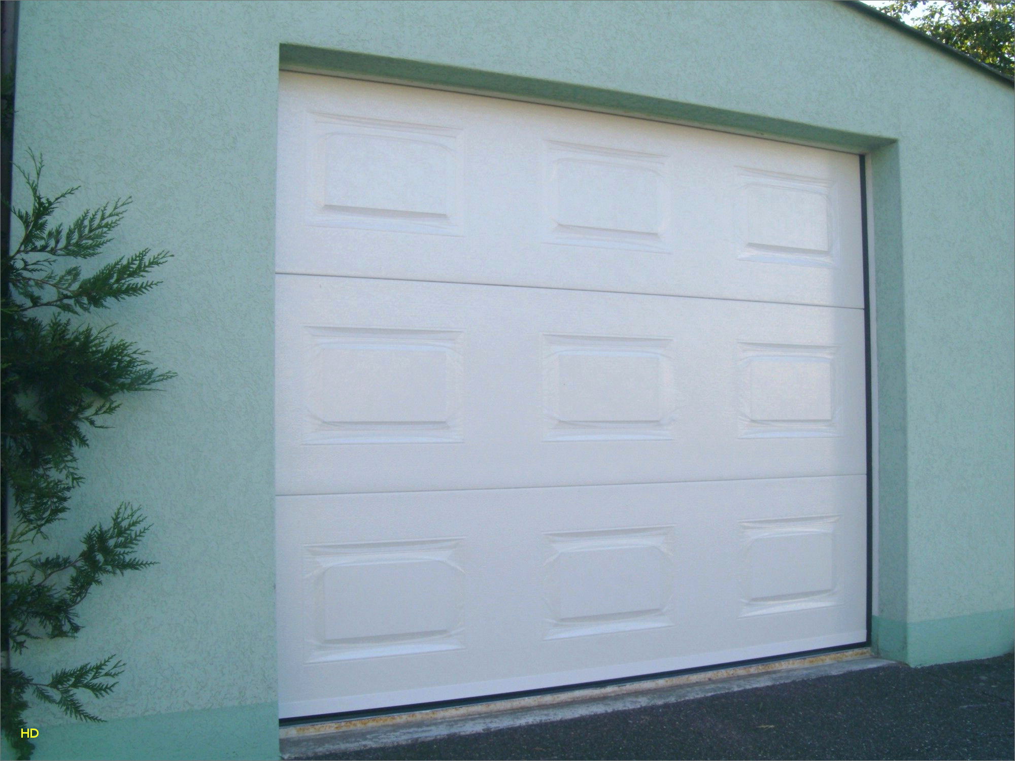 Leroy merlin porte de garage sectionnelle avec portillon
