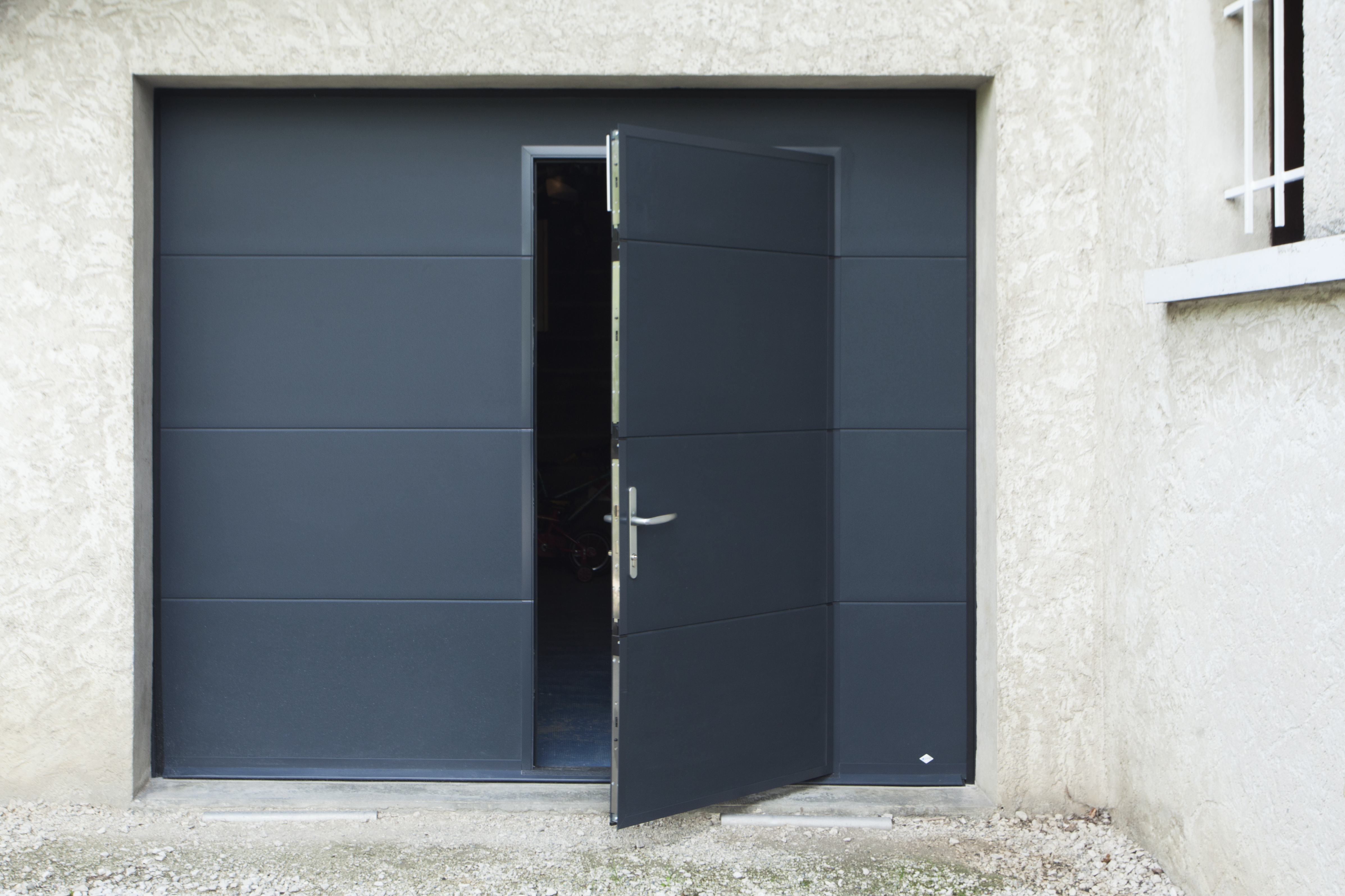 Porte de garage sectionnelle normstahl prix