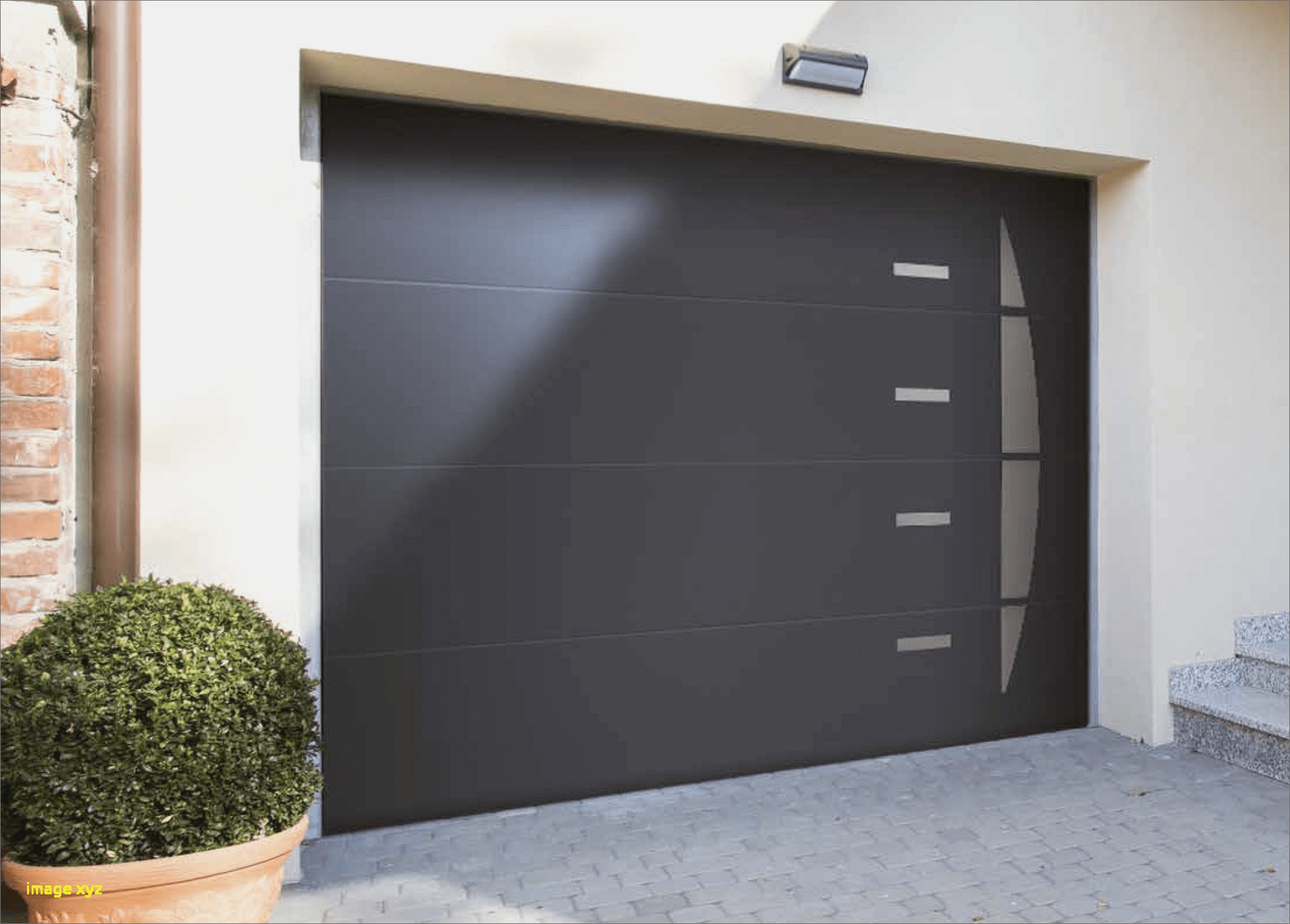 Prix porte de garage sectionnelle bricoman