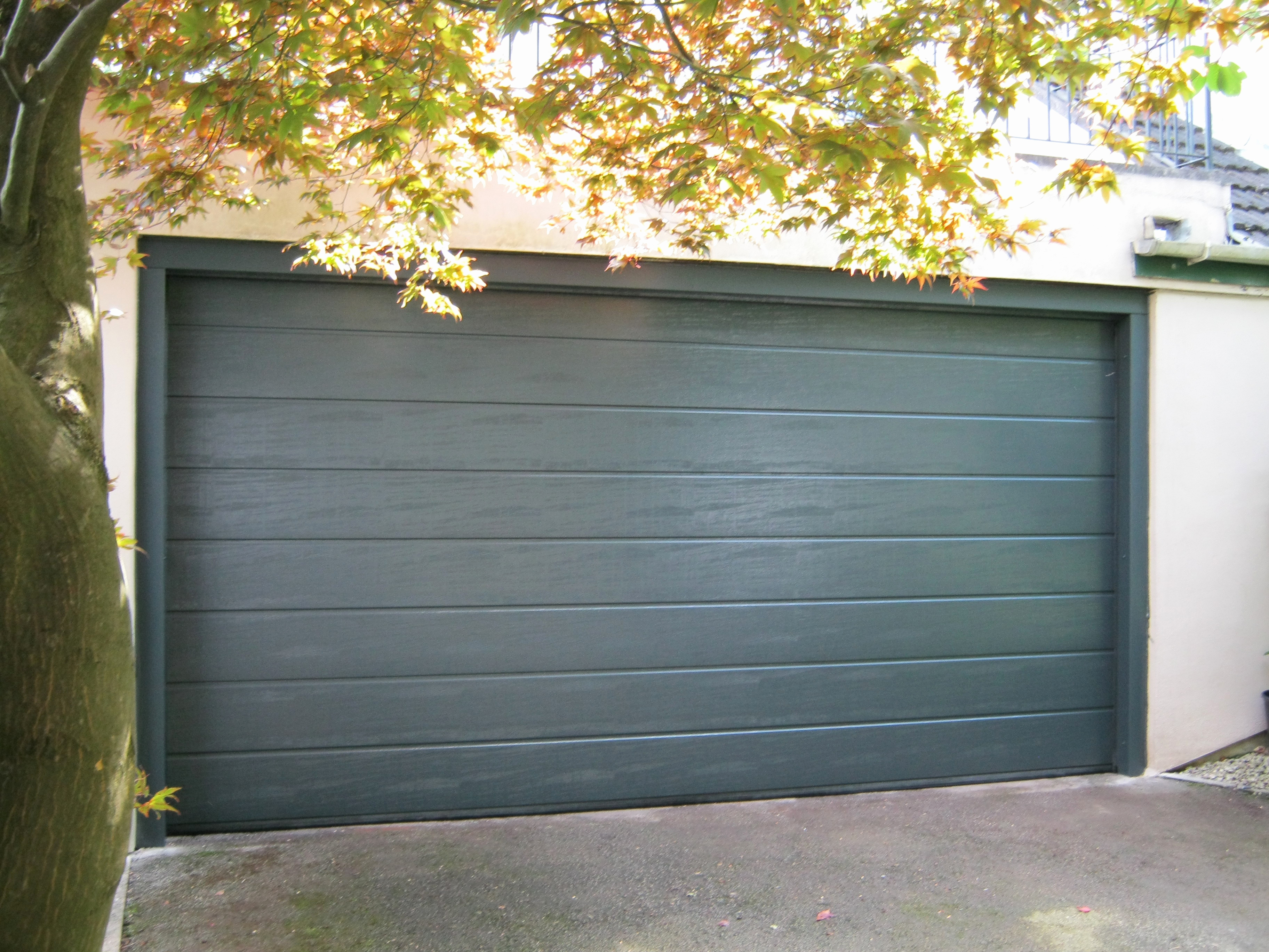 Poseur porte de garage