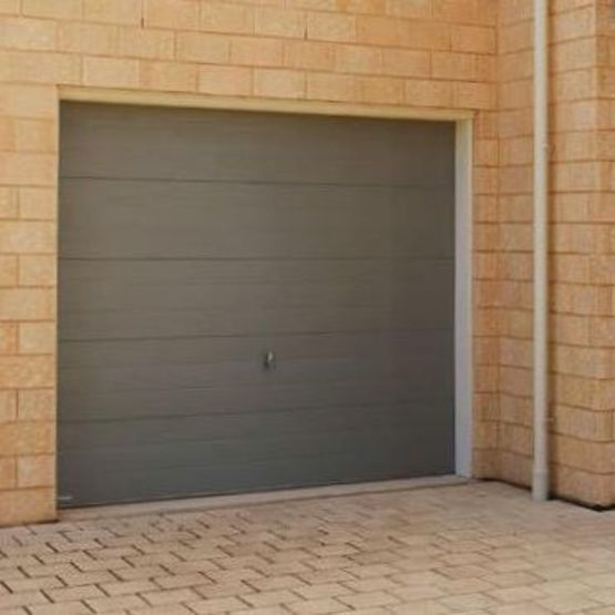 Porte de garage sectionnelle haute isolation