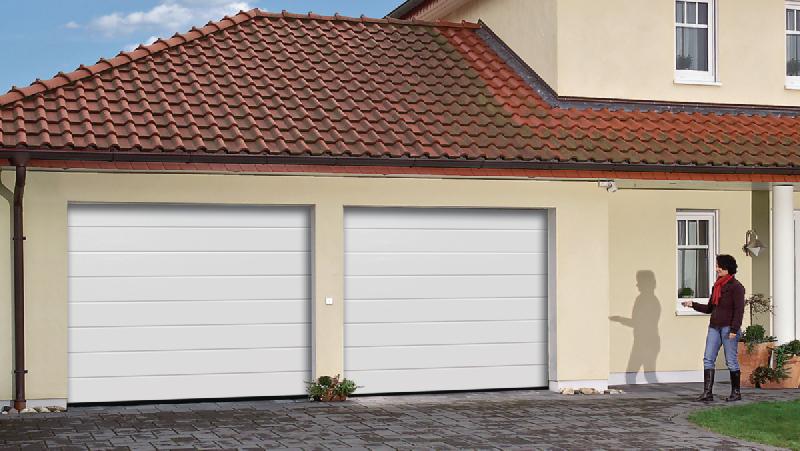 Porte de garage enroulable manuelle tubauto