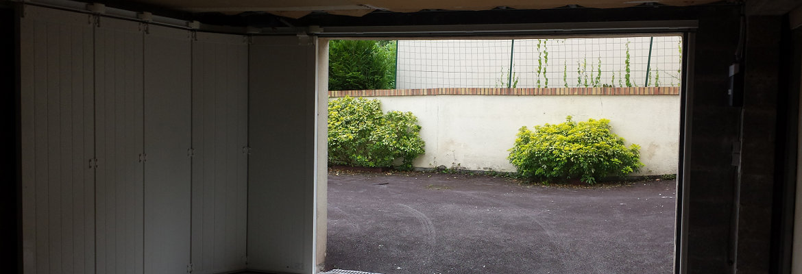 Installation porte de garage sectionnelle hauteur du linteau