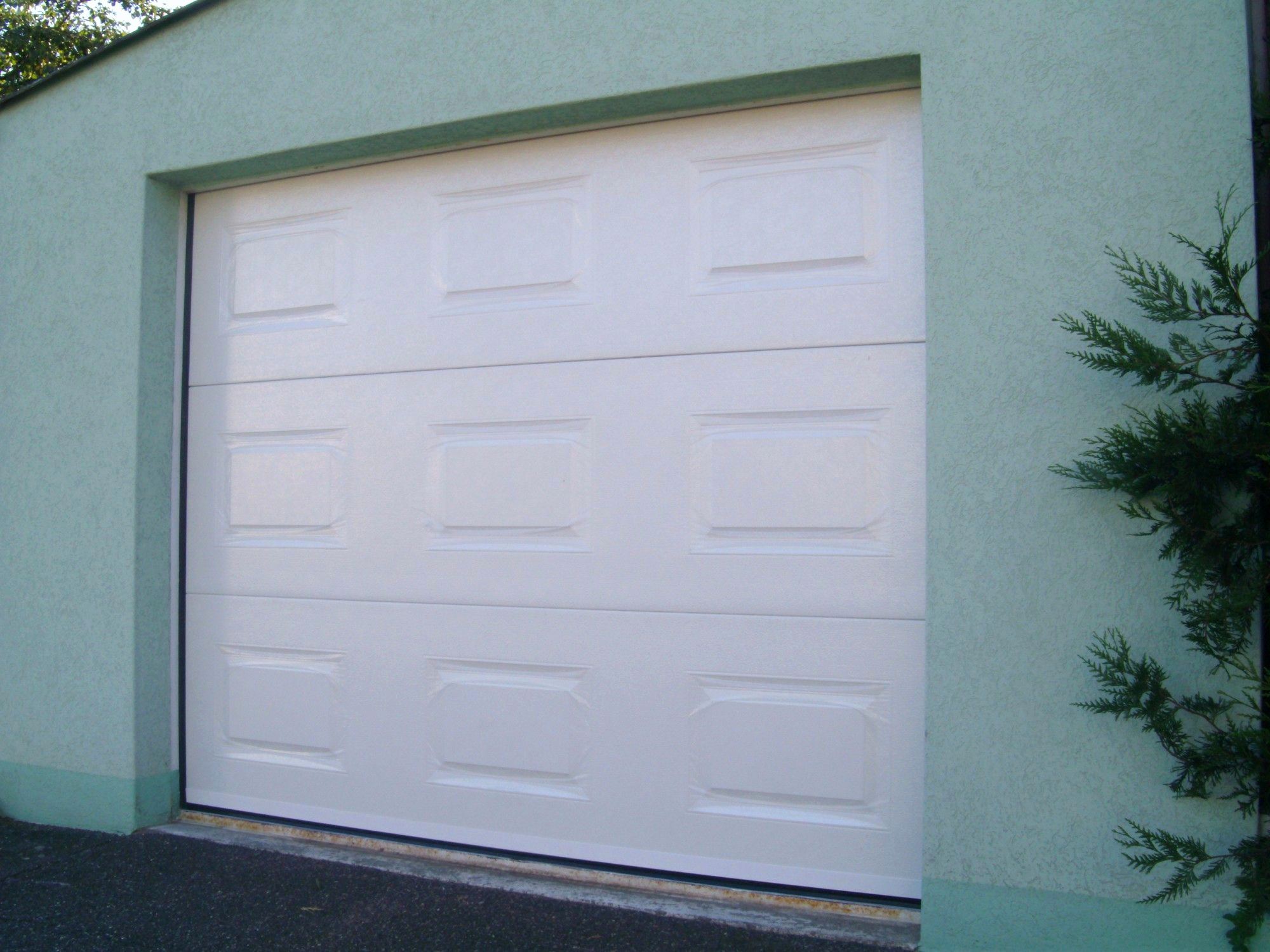 Porte de garage sectionnelle isoluxe