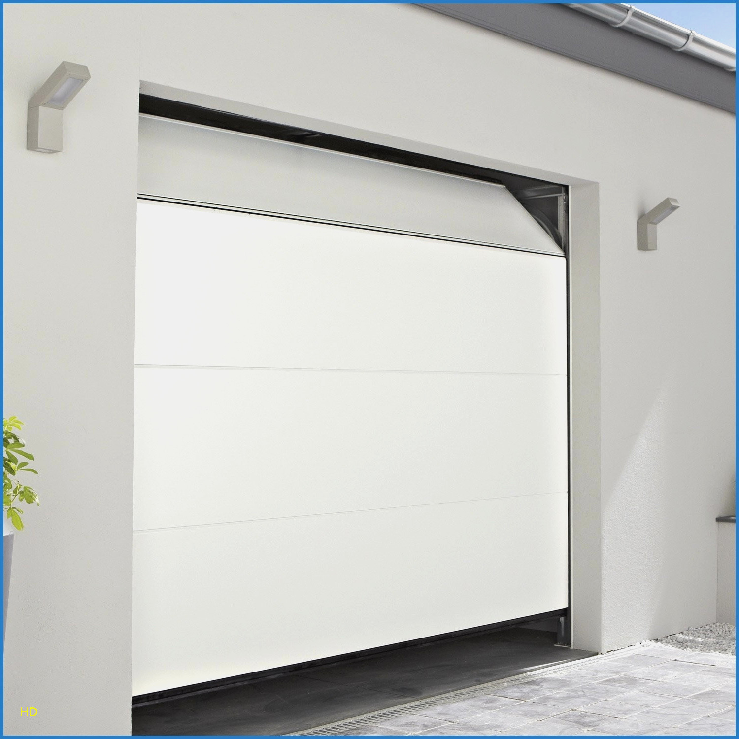 Installer une porte de garage sectionnelle motorisée castorama