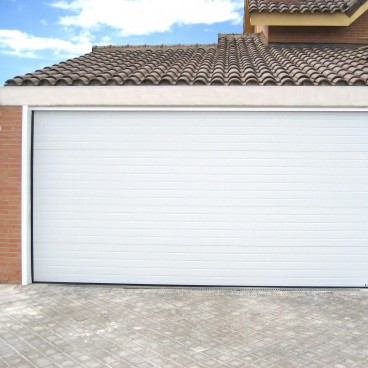 Porte de garage sectionnelle rainurée