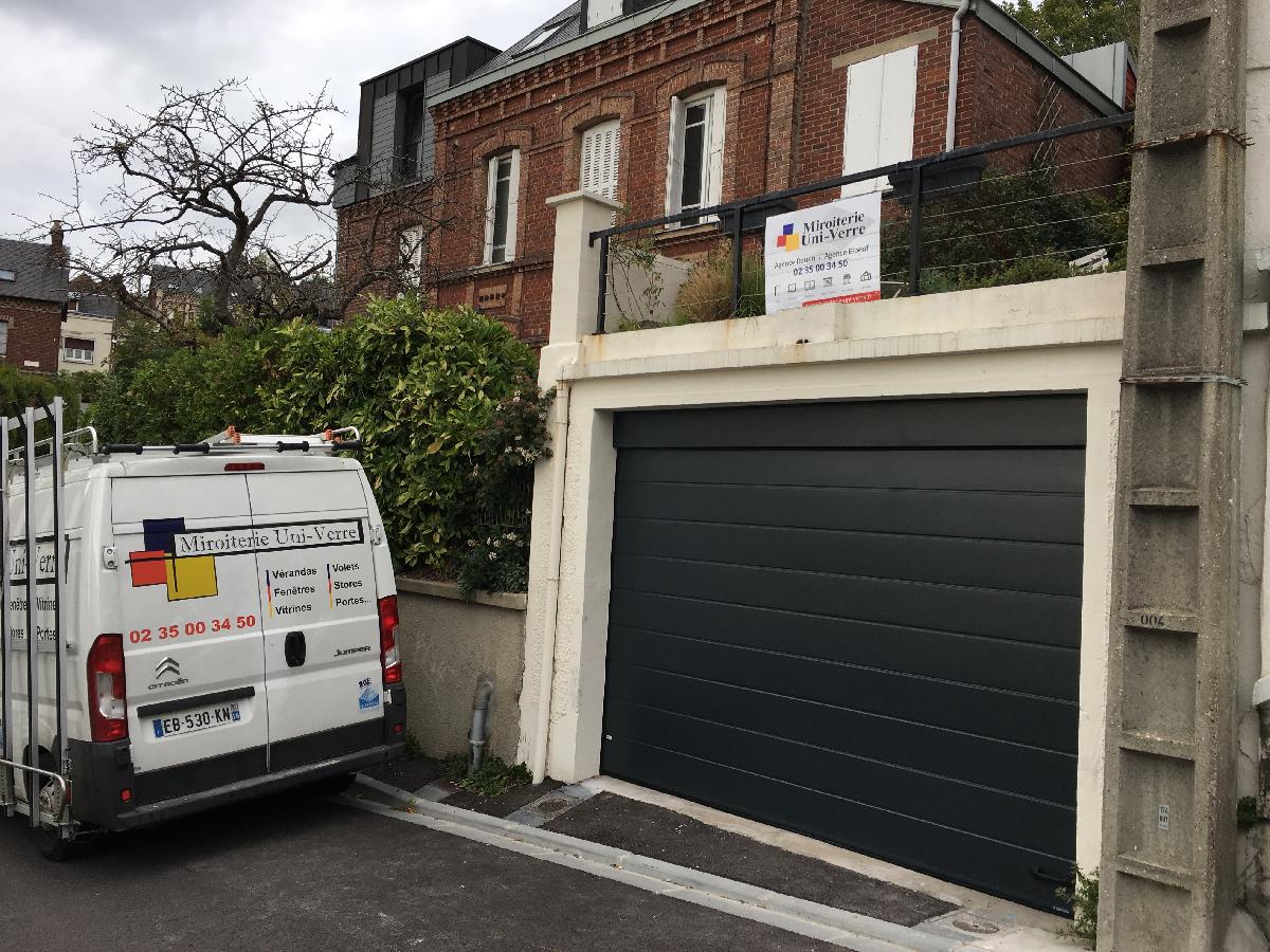 Porte de garage sectionnelle transport